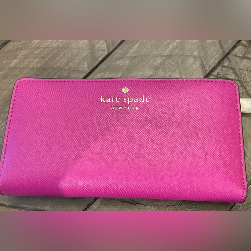 Brand New Kate Spade Wallet. Color Baja Rose.
